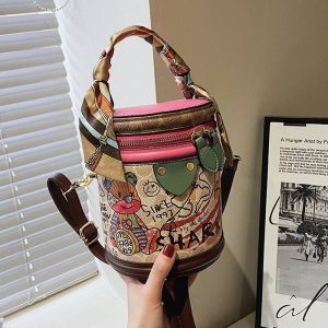 A generation of graffiti bucket bag women 2022 new fashion niche cylinder bag portable single shoulder Messenger women's bag
