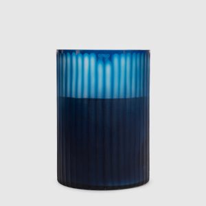 Royal Blue XL candle with Ginger Fig scent in a glass candle holder Onno