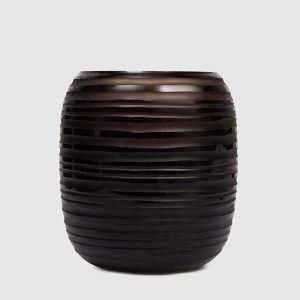 Sphere Amber XL candle with Zanzibar scent in a glass candle holder Onno