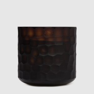 Circle Amber S candle with Safari scent in a glass candle holder Onno