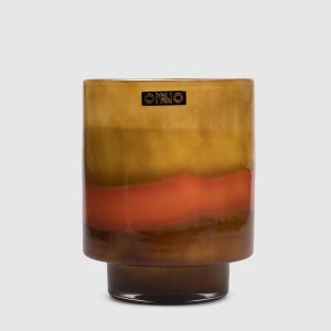 Art Romy L candle with Cashmere Wood scent in a glass candle holder Onno