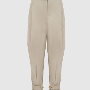 Slack trousers with pintucks and buckles on the legs CO
