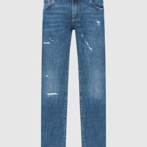 Blue jeans with a distressed effect with holes Dolce&Gabbana